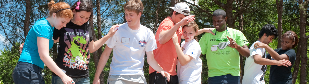 A group of female and male students play together