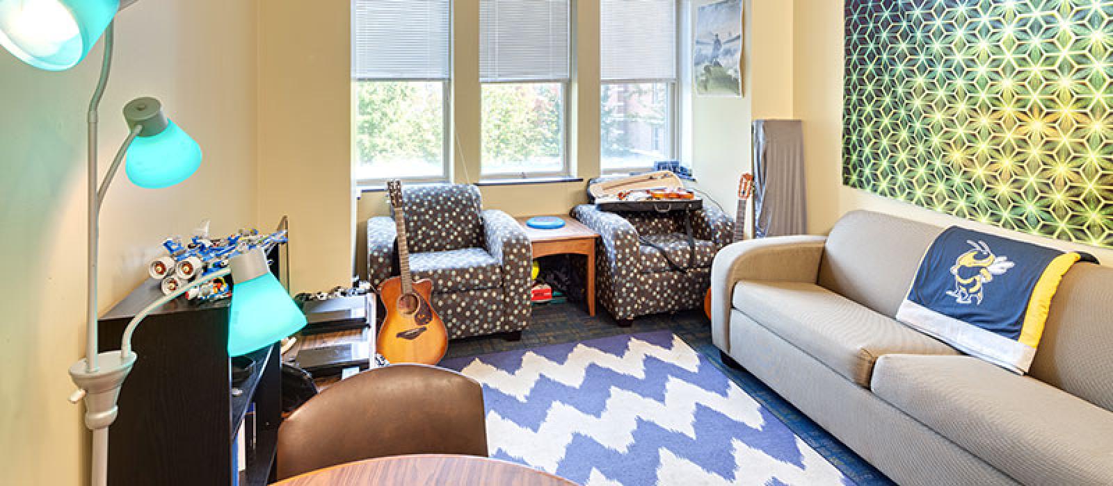 Furnished living room with extra student decorations.